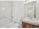Clean bathroom with a tub, toilet, and vanity with sink at 4321 W 118Th Pl, Westminster, CO 80031