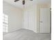 Bedroom with ceiling fan, carpet, and double doors to closet at 4321 W 118Th Pl, Westminster, CO 80031