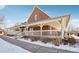 Brick community clubhouse with a wraparound porch at 4321 W 118Th Pl, Westminster, CO 80031
