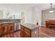 Open-concept kitchen featuring stainless steel appliances, an island, and seamless flow to other living areas at 4321 W 118Th Pl, Westminster, CO 80031