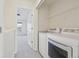 Convenient laundry room with washer, dryer, and shelving at 4321 W 118Th Pl, Westminster, CO 80031