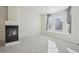 Living room featuring a fireplace and large windows at 4321 W 118Th Pl, Westminster, CO 80031