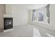 Bright living room with fireplace, large bay windows with natural light and neutral carpeting at 4321 W 118Th Pl, Westminster, CO 80031