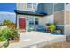 Inviting front porch with seating and potted plants, creating a cozy entrance to the home at 2790 Center Park Way, Berthoud, CO 80513