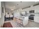 Open concept kitchen with stainless steel appliances, granite countertops, and pendant lighting at 2790 Center Park Way, Berthoud, CO 80513