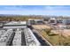 An aerial view of modern homes with the city skyline in the background, showcasing urban living at 4244 E 8Th Pl, Denver, CO 80220