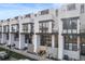 Stunning view of modern townhomes showcasing contemporary design and architecture at 4244 E 8Th Pl, Denver, CO 80220