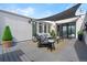 Relaxing rooftop deck featuring comfortable outdoor seating, shade covering, and stylish decor at 4244 E 8Th Pl, Denver, CO 80220