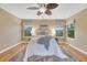 Bright bedroom with a ceiling fan and large windows with nice views at 123 Wheat Ridge St, Palmer Lake, CO 80133