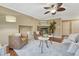 Comfortable living room with fireplace, seating, and decor at 123 Wheat Ridge St, Palmer Lake, CO 80133