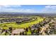 Aerial view showing community amenities like a golf course, tennis court, and neighborhood homes at 23060 Hope Dale Ave, Parker, CO 80138