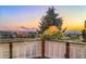 Balcony view showcasing neighborhood homes and distant mountains, enhancing outdoor living appeal at 23060 Hope Dale Ave, Parker, CO 80138