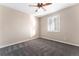 Clean, carpeted bedroom with a ceiling fan and plantation shutters allowing for natural light at 23060 Hope Dale Ave, Parker, CO 80138