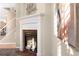 Close up view of a modern fireplace with decorative mantle and hearth at 23060 Hope Dale Ave, Parker, CO 80138