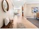 Inviting foyer with hardwood floors, neutral walls, and modern decor at 23060 Hope Dale Ave, Parker, CO 80138