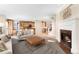 Open concept living room flowing to the kitchen and staircase, bright and inviting at 23060 Hope Dale Ave, Parker, CO 80138
