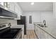 Kitchen with stainless steel appliances, granite countertops and sleek cabinetry at 14720 E Kentucky Dr # 612, Aurora, CO 80012