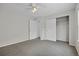 Empty bedroom with large closet, neutral paint and carpet at 5124 S Jebel St, Centennial, CO 80015