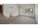 Open-concept living room with stairs to the second level at 5124 S Jebel St, Centennial, CO 80015