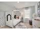 bedroom with a unique bed frame and playful decor at 17919 Dandy Brush Dr, Parker, CO 80134