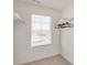 Spacious walk-in closet with window and built-in shelving at 17919 Dandy Brush Dr, Parker, CO 80134