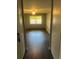 A bedroom with dark wood-look floors and a ceiling fan at 665 S Clinton St # 14A, Denver, CO 80247