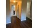 Hallway leads to bathroom and bedroom closets at 665 S Clinton St # 14A, Denver, CO 80247