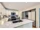 Spacious kitchen featuring granite countertops, stainless steel appliances, and ample cabinet space for storage at 7559 S Ivanhoe Cir, Centennial, CO 80112
