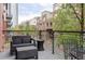Cozy balcony area, perfect for relaxing outdoors and enjoying the surrounding cityscape at 1440 Little Raven St # 202, Denver, CO 80202