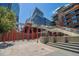 Modern cityscape featuring a pedestrian bridge with interesting architectural design and vibrant atmosphere at 1440 Little Raven St # 202, Denver, CO 80202