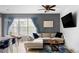 Comfortable living room with large windows, stylish furnishings and plenty of seating at 1440 Little Raven St # 202, Denver, CO 80202