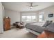 Bright bedroom featuring a ceiling fan, hardwood floors, and natural light at 3142 W 20, Denver, CO 80211