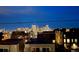 Night view of the city skyline, as seen from a modern, comfortable home at 3142 W 20, Denver, CO 80211