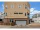 Spacious garage of a modern home with a neutral exterior and a private driveway at 3142 W 20, Denver, CO 80211