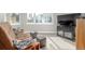 Cozy living room featuring a futon, cube ottomans, and a TV, creating a welcoming space at 3142 W 20, Denver, CO 80211