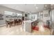 Bright open living area with a spacious kitchen, dining, and fireplace feature at 3142 W 20, Denver, CO 80211