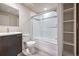 Basement bathroom with shower/tub combo and linen closet at 2030 W 66Th Ave, Denver, CO 80221