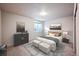 Spacious basement bedroom with window and plush bedding at 2030 W 66Th Ave, Denver, CO 80221