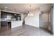 Spacious dining area with hardwood floors and natural light at 2030 W 66Th Ave, Denver, CO 80221