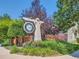 Elegant Danbury Park community sign surrounded by beautiful landscaping and brick accents at 12819 E Dickensen Pl, Aurora, CO 80014