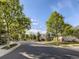 Inviting street view showcasing well-maintained homes and tree-lined streets in a peaceful community at 12819 E Dickensen Pl, Aurora, CO 80014