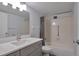 Updated bathroom with vanity and bathtub at 13601 E Marina Dr # 404, Aurora, CO 80014