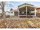 Backyard featuring covered porch and brick siding at 2228 S Eldridge St, Lakewood, CO 80228