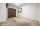 Finished basement area with carpet, neutral walls, and a closet at 2228 S Eldridge St, Lakewood, CO 80228