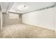 Basement with carpeting, wallpaper border, and natural light from the window at 2228 S Eldridge St, Lakewood, CO 80228