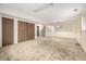 Large finished basement with ample space, storage closets, and a nearby stairway at 2228 S Eldridge St, Lakewood, CO 80228