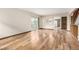 Living room showing access to kitchen and outdoor deck at 2228 S Eldridge St, Lakewood, CO 80228