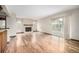 Spacious living room with fireplace and sliding glass doors to the deck at 2228 S Eldridge St, Lakewood, CO 80228