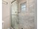 Shower features tile and a glass enclosure at 2228 S Eldridge St, Lakewood, CO 80228