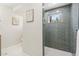 Contemporary bathroom featuring gray tiled shower and modern fixtures at 1472 Sinton Rd, Evergreen, CO 80439